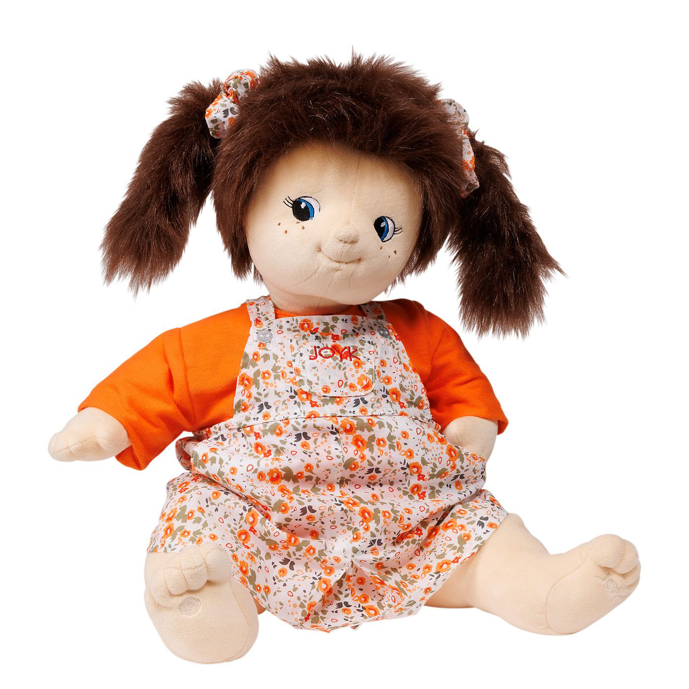 Joyk empathy doll Simone with brown pigtails, orange shirt and floral romper, sitting