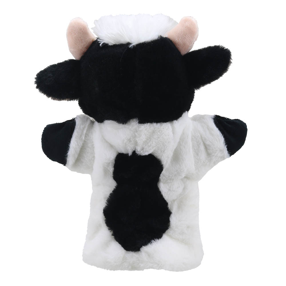 The Puppet Company baby hand puppet cow, black and white puppet seen from behind with a black patch on its back, back view