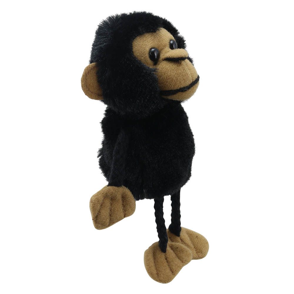 The Puppet Company finger puppet chimpanzee, black puppet with a beige face, side view