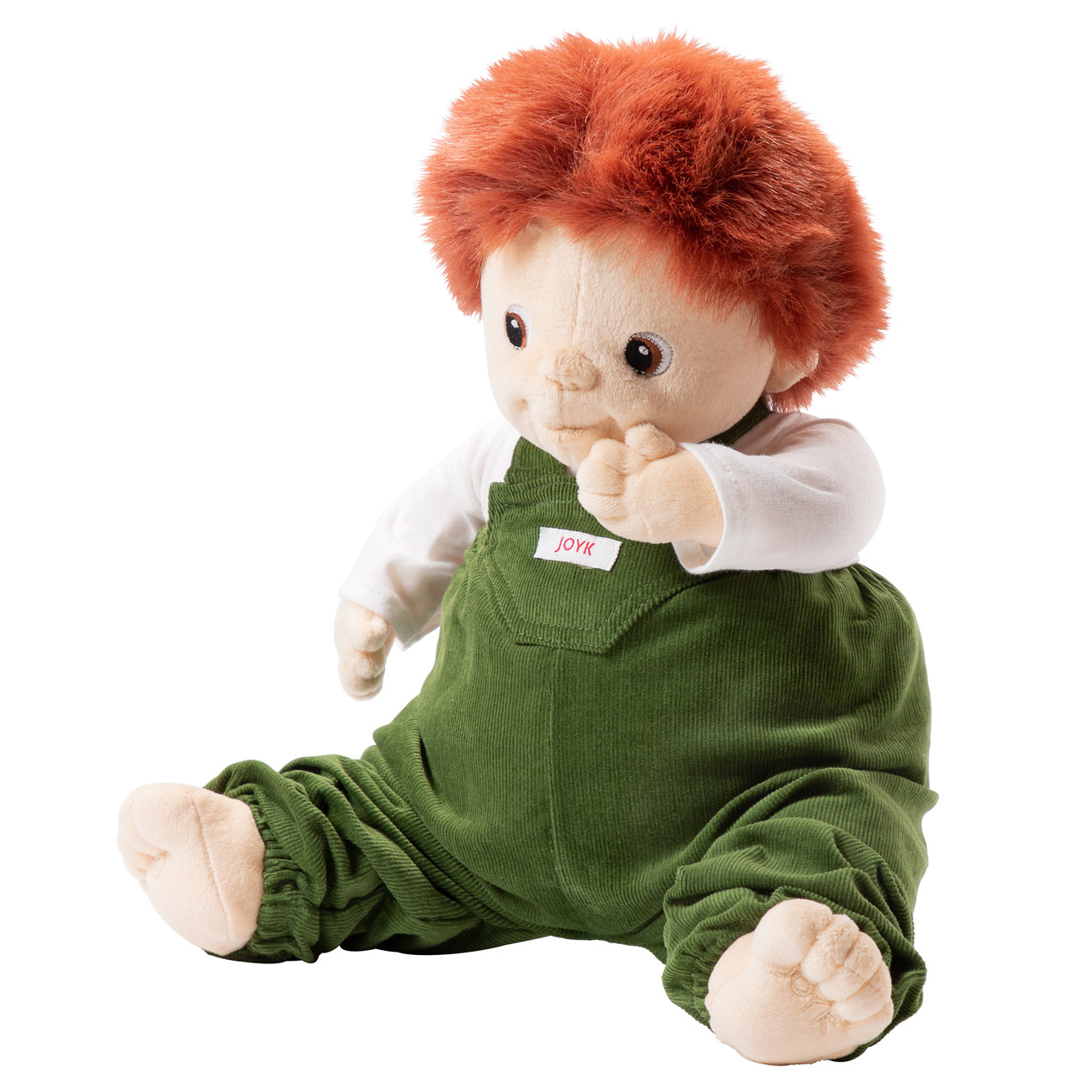 Joyk empathy doll Sam with red tousled hair, white shirt and green corduroy dungarees, sitting