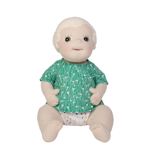 Rubens Barn baby doll Carl with light hair, green patterned shirt and colourful nappy pants, sitting