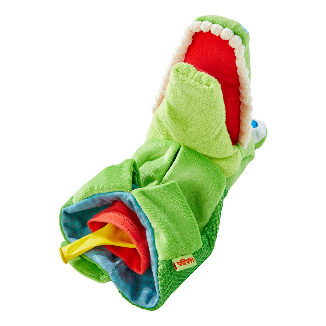 HABA baby hand puppet crocodile Allesfresser, lying down with wide-open red mouth and mesh pocket on the belly