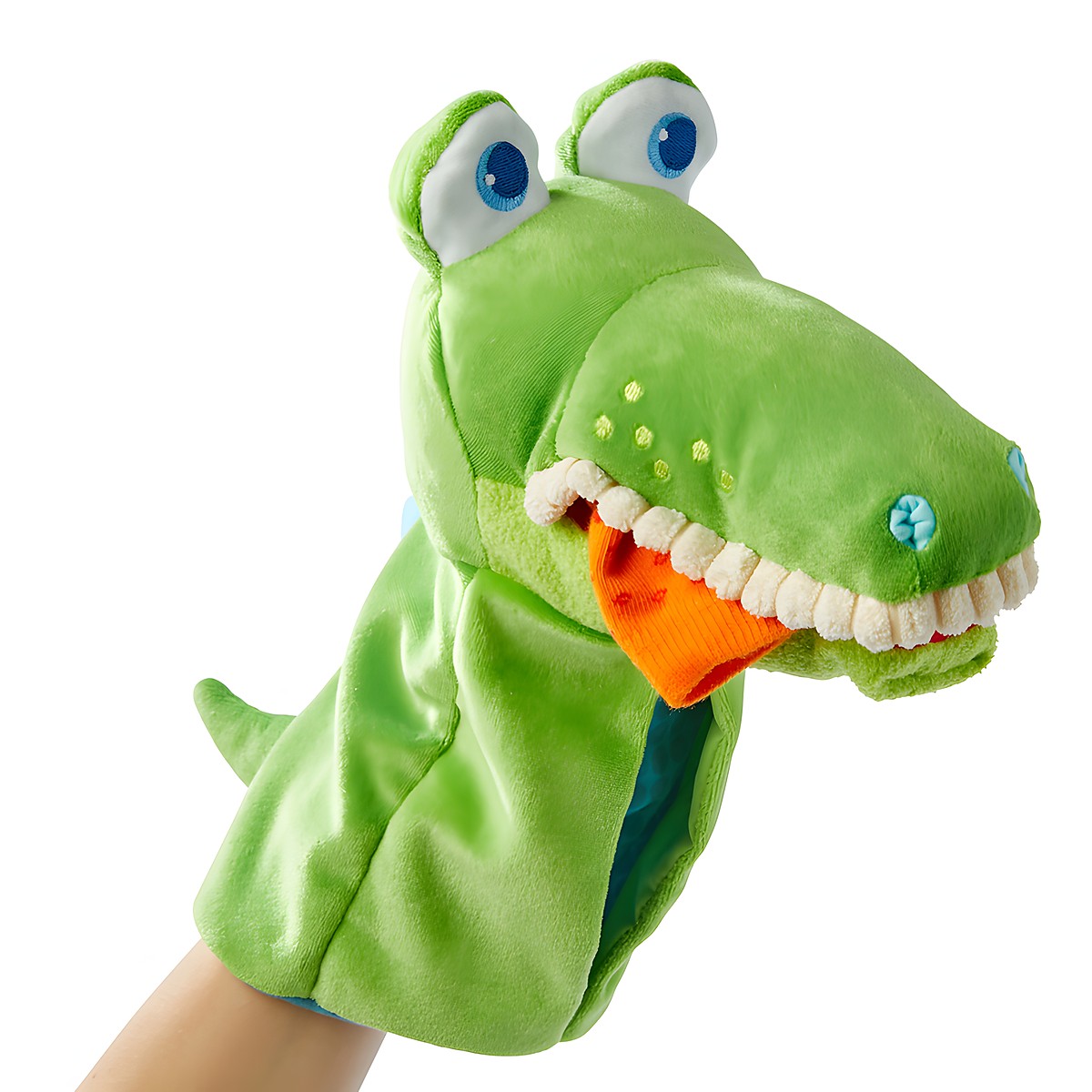 HABA Baby-Handpuppe Krokodil Allesfresser, am Arm getragen mit orangefarbenem Stoffstück im Maul